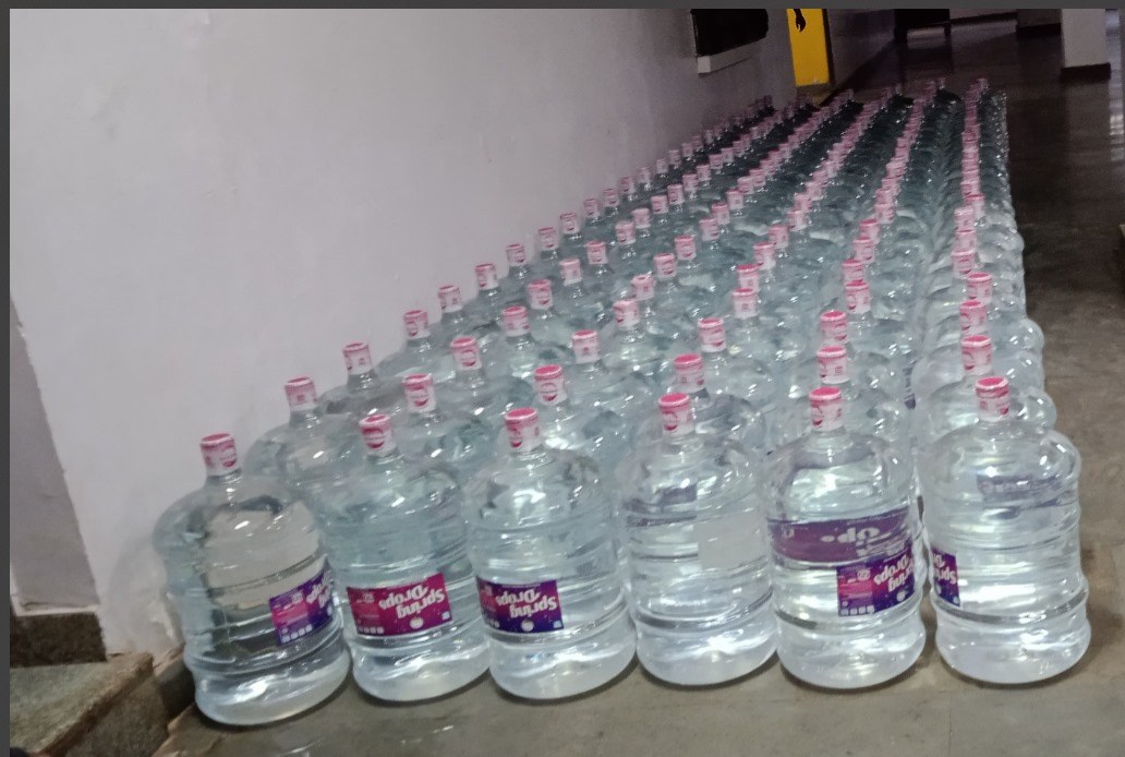 Rows of 20 litre water jars ready for dispatch